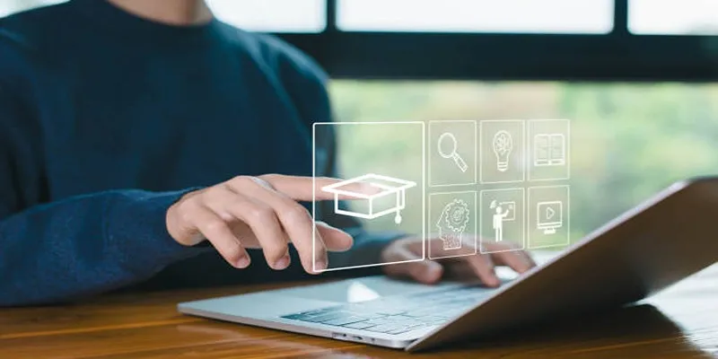 A laptop displaying online course modules