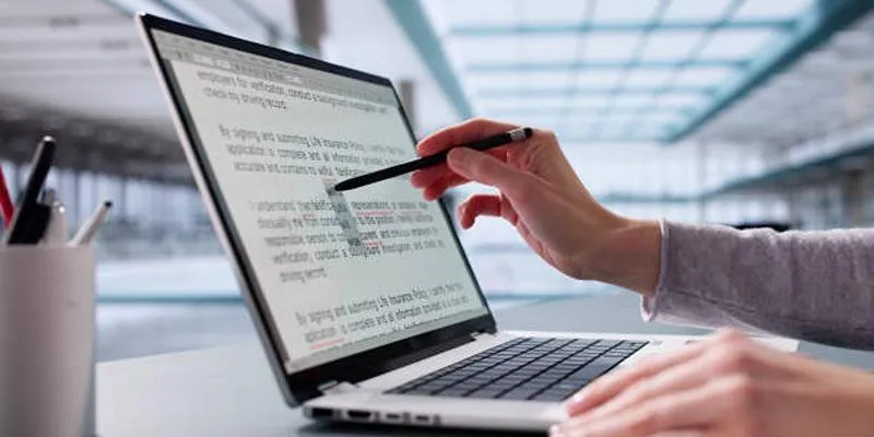 A person comparing documents