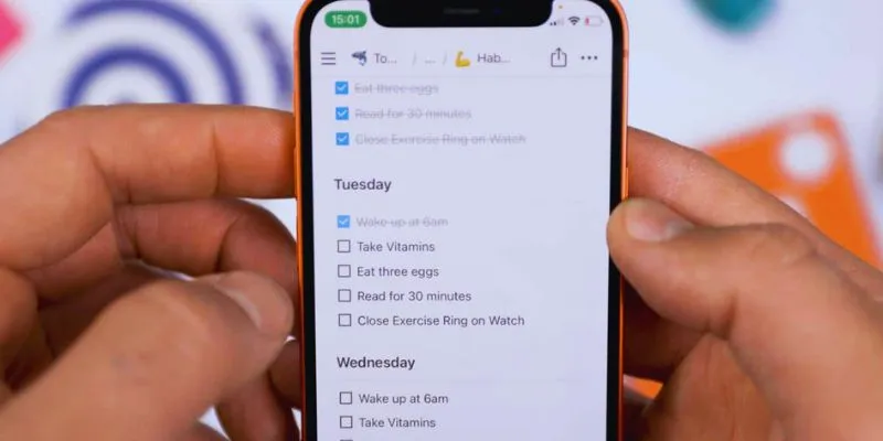 Various habit tracker apps displayed on different devices